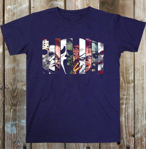 A blue short-sleeve t-shirt laid flat on a white wood plank background, featuring a large graphic print of horror movie villains' faces.