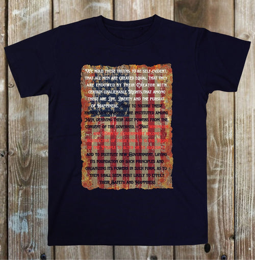 Black t-shirt with a printed design on a wooden surface
