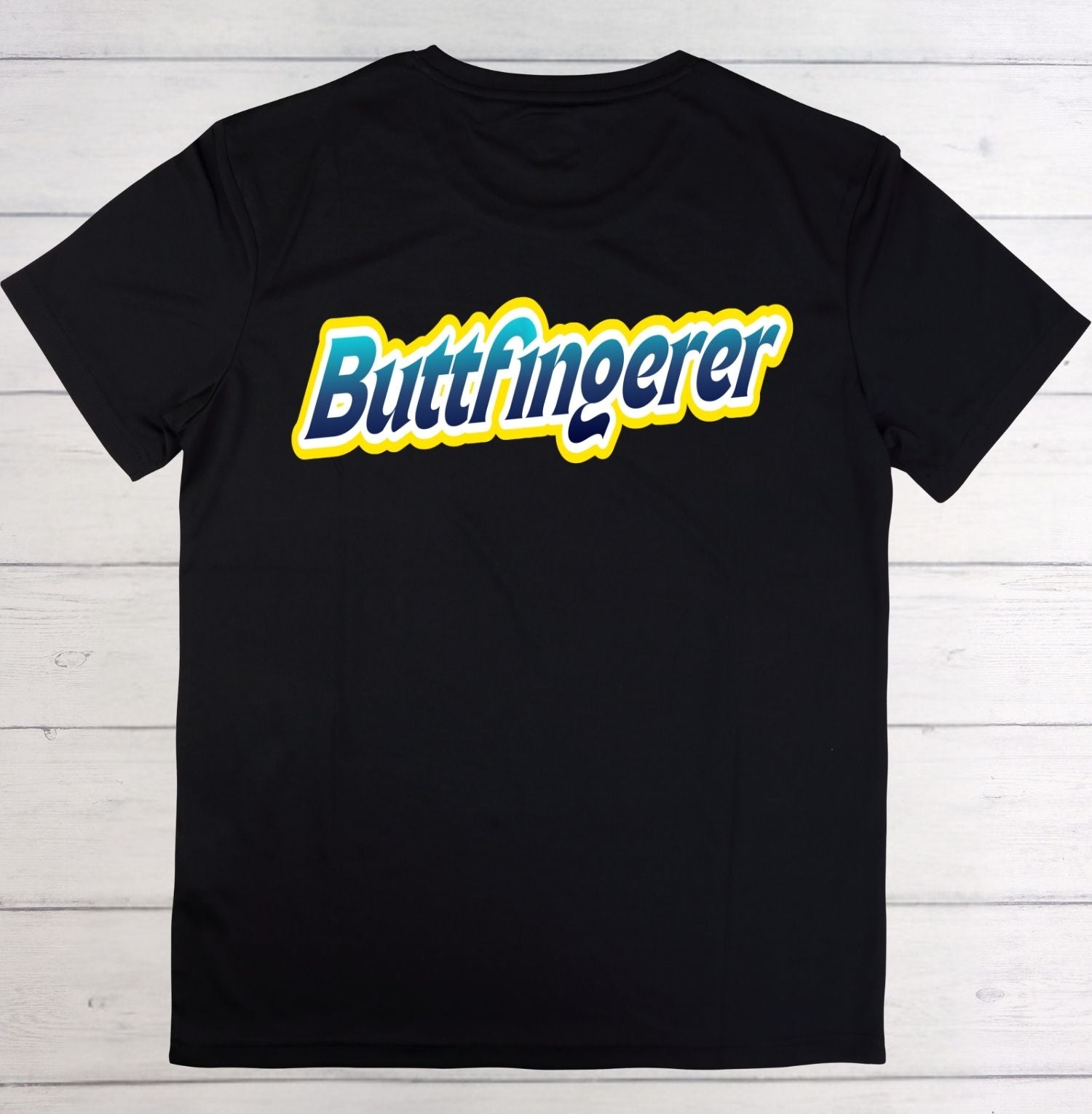 Black t-shirt with 'Buttfingerer' text on a wooden surface