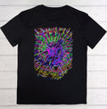 Black t-shirt with a colorful graphic design on a wooden surface